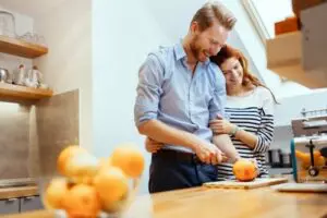 Image of a couple seeming comfortable in their environment. Three Reasons to Consider a Geothermal Heat Pump.