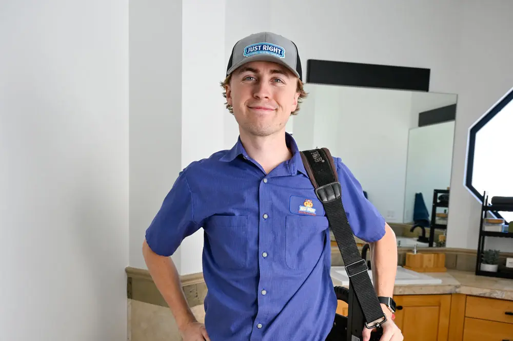 just right team member posing for picture in a home