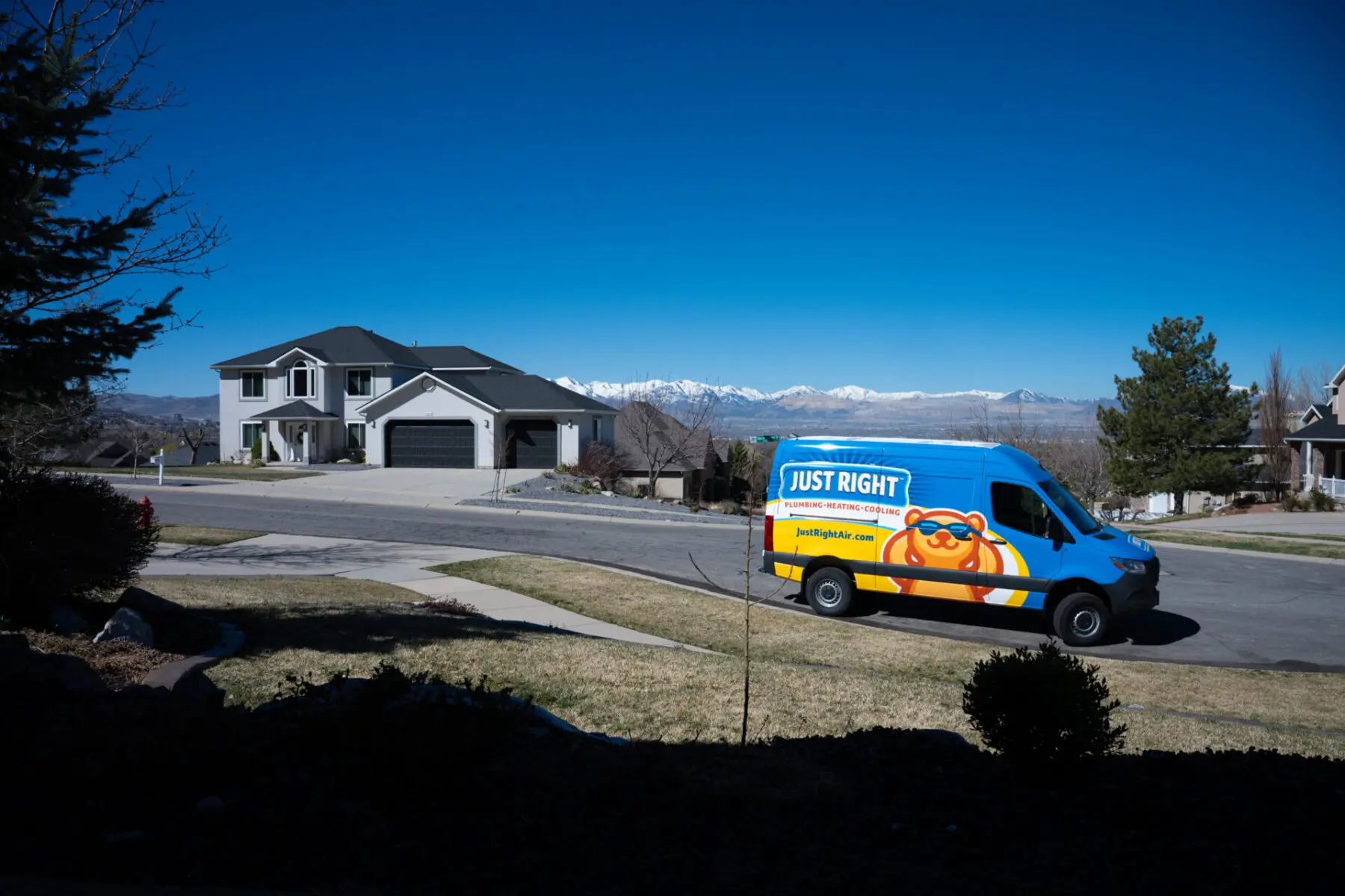 Just right van parked in front of a house