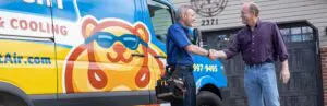 team member talking with a customer near a Just Right service truck