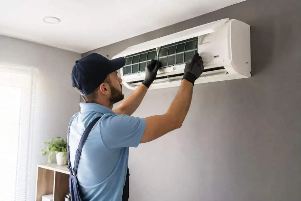 HVAC technician performing AC installation and replacement South Salt Lake, UT service