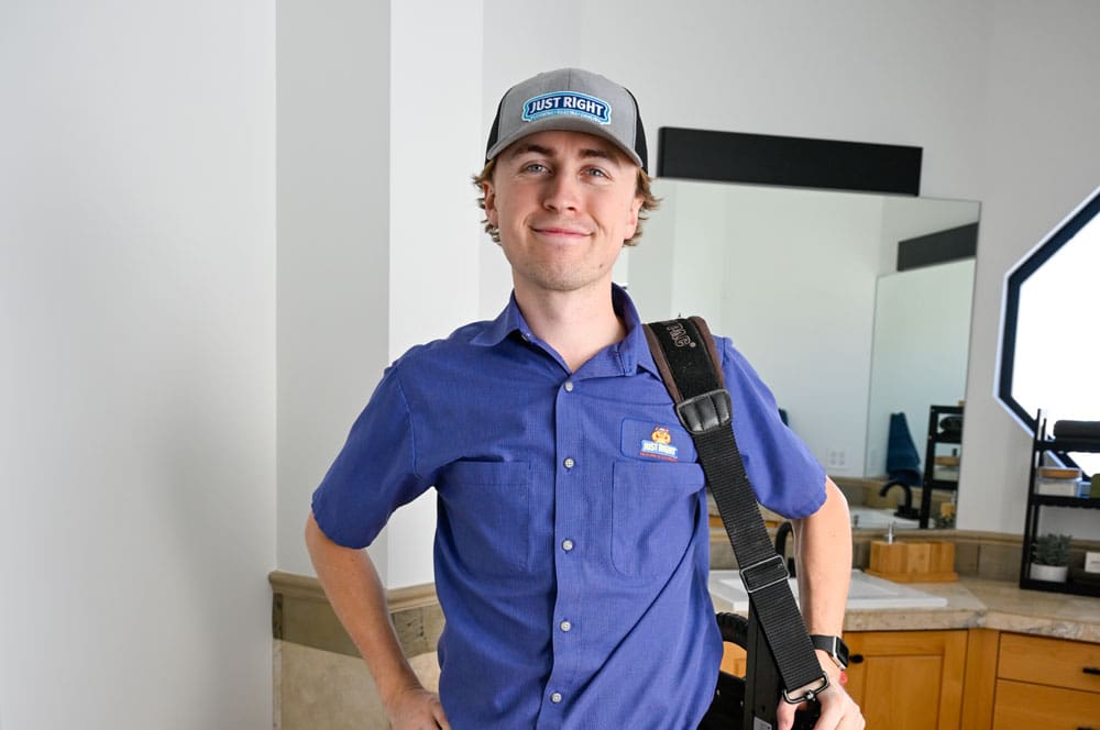 just right team member posing for picture in a home