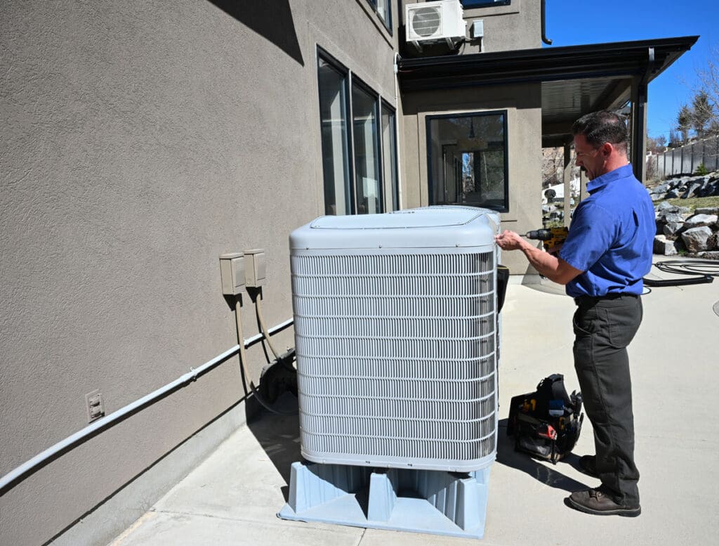 Air Conditioning - Just Right just right team member repairing air conditioning unit