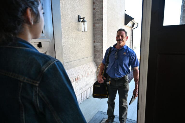 Just Right Plumber being greeted at the door