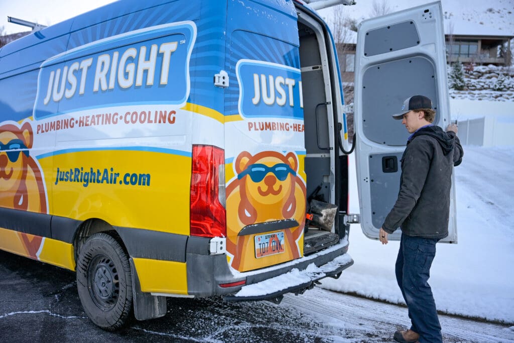 Professional plumber in Salt Lake County, UT fixing residential water lines